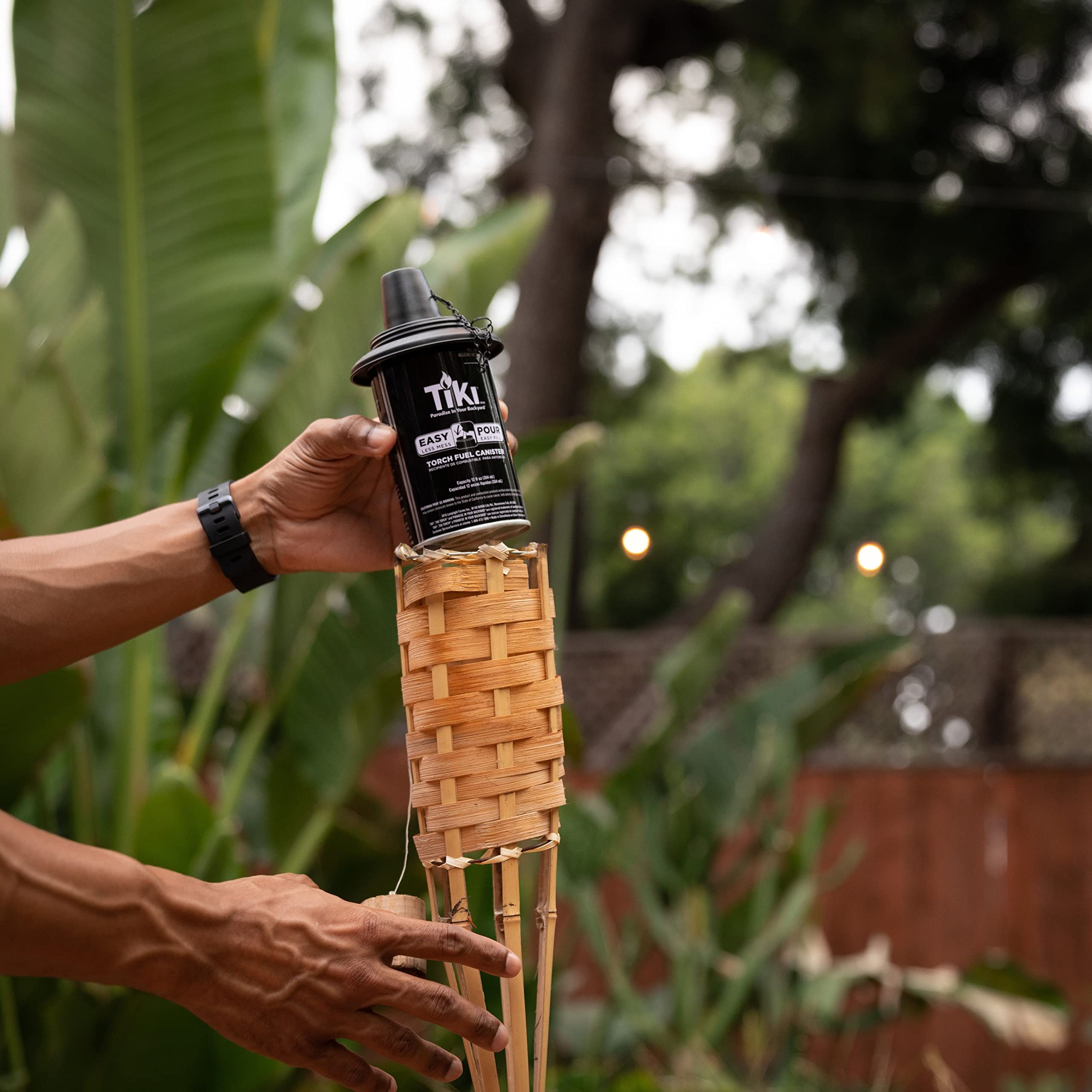 TIKI Bamboo Tiki Torches 4-Pack – Weather-Resistant Outdoor Décor with Easy-Pour Wide-Mouth Canister Refill for Patio, Garden, Backyard, and Parties, 57-Inch Citronella Torches